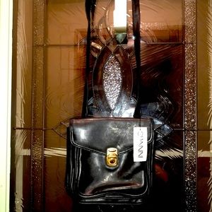 NEW Giannini black faux leather crossbody bag w gold metal closure.